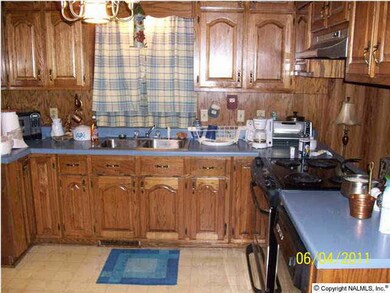 kitchen open to den area and screened in porch = easy entertaining!