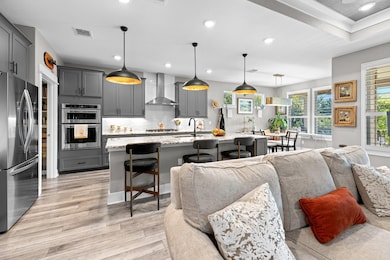 Gorgeous kitchen with designer lighting.