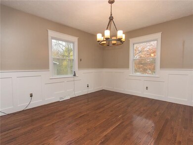 BEAUTIFUL, OPEN DINING ROOM WITH PANELED CHAIR RAI