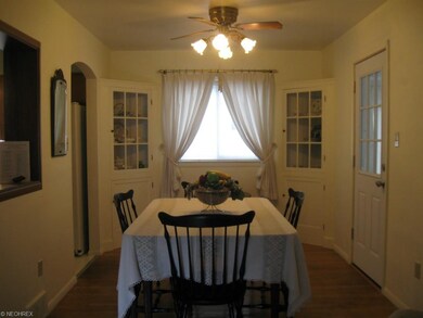 Formal dining room is open to living room and with