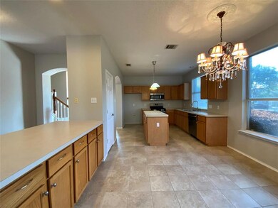 Breakfast area with additional counter space and cabinets