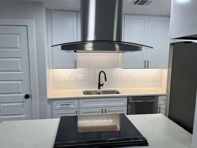 Kitchen with brand new electric range