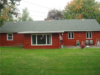 Exterior Back. Newer windows that tilt in for easy