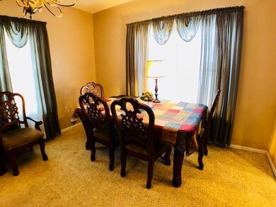 Open LR/DR space with neutral carpet.