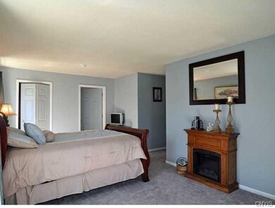 Master bedroom offers a retreat feeling in this ho