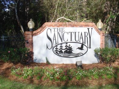 Sanctuary gated entrance with guard house. Another