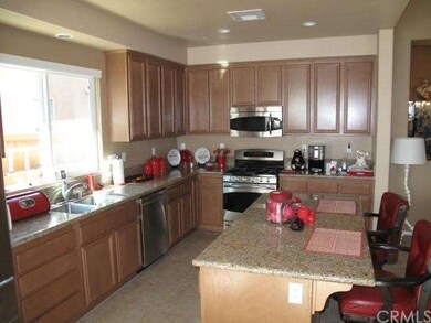 This spacious, upgraded kitchen showcases gorgeous