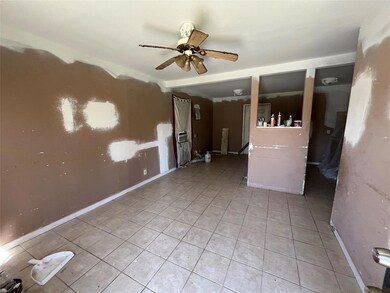 Spare room featuring light tile patterned flooring