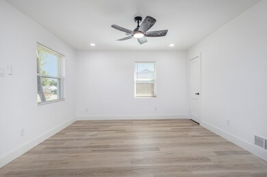 Unfurnished room with light wood-style flooring, recessed lighting, and ceiling fan