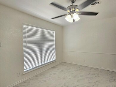 Empty room with a wealth of natural light, tile fl
