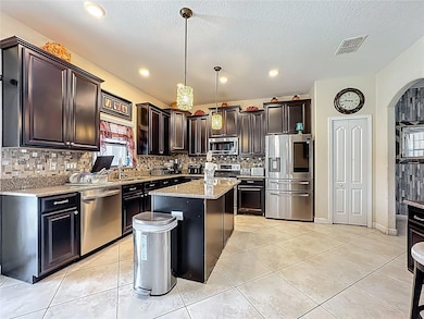 1303 Sea Pines Way, Davenport, FL 33896 - photo 6