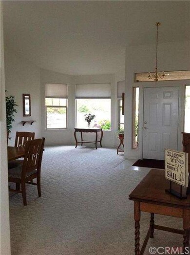 Bright, Open Living Room and Formal Dining Room.