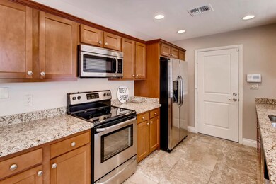 Kitchen, stove, fridge side