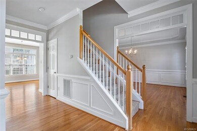 Foyer view into the eat-in kitchen and the formal 