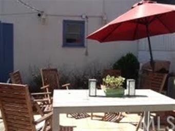 Private patio separates both buidings.