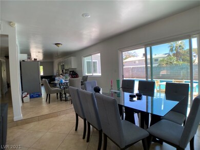 Dining Room. Breakfast area/Kitchen Beyond