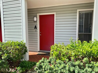 Pretty red door welcomes you into the home.