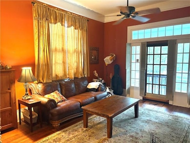 Second living area open to kitchen and front porch
