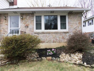 Front view featuring stone front