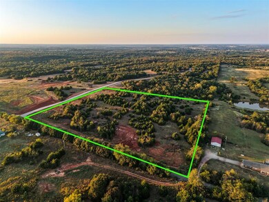 Aerial view of property and surrounding area featuring property parcel outlined