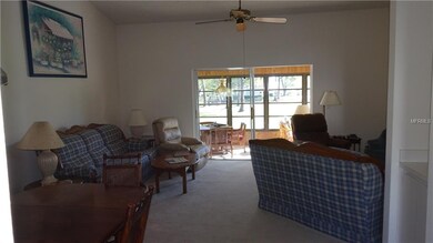 Dining/Living room has cathedral ceilings and a sm