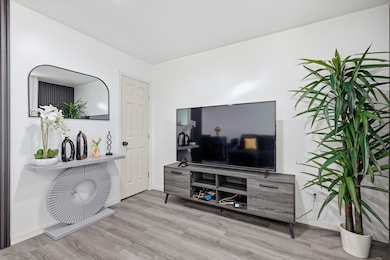 Living room featuring light wood finished floors