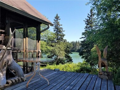 Deck leading into screen porch.