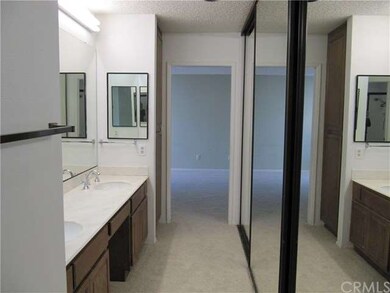 Master Bathroom with Dual Sinks and Lots of Closet