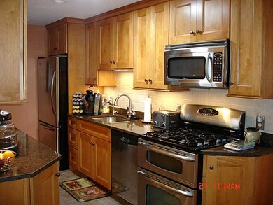 Kitchen. Gourmet kitchen features stainless applia