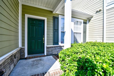 Property entrance featuring a porch