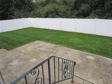 Private yard with newer vinyl fencing and patio fo