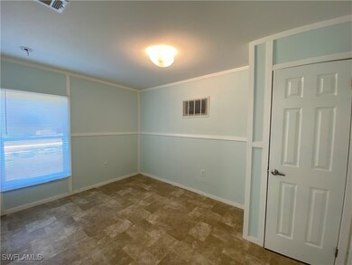Spare room featuring ornamental molding