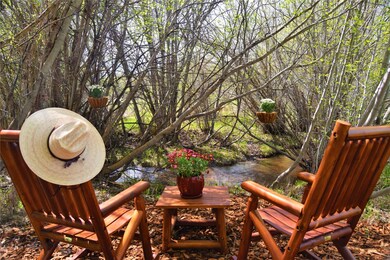 Read a book, unwind, dine or wine by the creek or