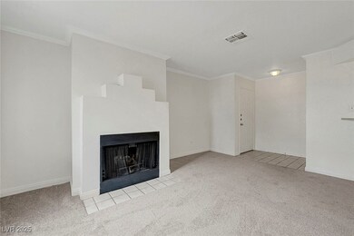 Unfurnished living room featuring carpet floors, o