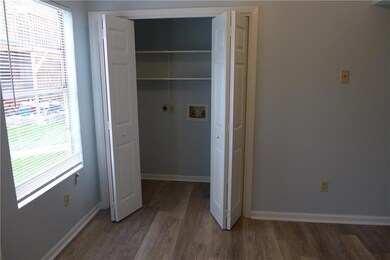 Laundry area with hookup for a washing machine, w