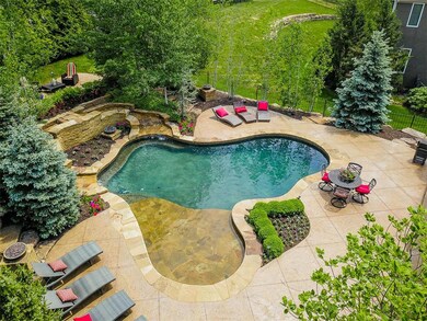 Gunite saltwater pool with Pebble Tec finishing.