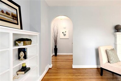 Built-ins and round arch detail