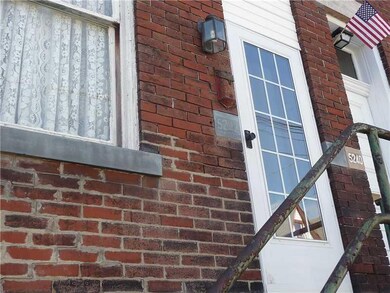 Exterior Front. View of storm door leading to entr