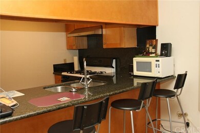 open concept kitchen with bar stool