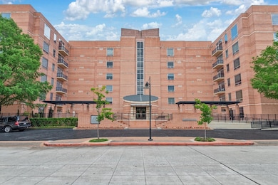 Grand elevation with secure building access via ke