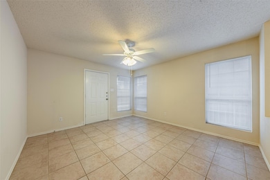 Unfurnished room with a textured ceiling, ceiling