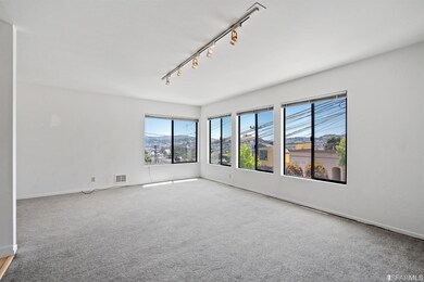 Lower Level Living/Dining Room Showing Corner Wind