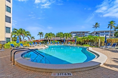 Community pool with a patio area