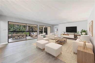 100 Wyndemere Way unit A-203, Naples, FL 34105 - photo 2