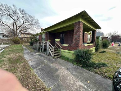 View of property exterior featuring a yard