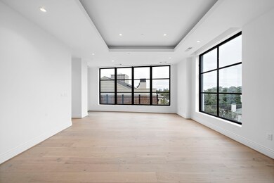 Living room: expansive windows usher in an abundan