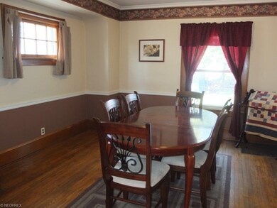 Formal dining room with chair rail and crown moldi