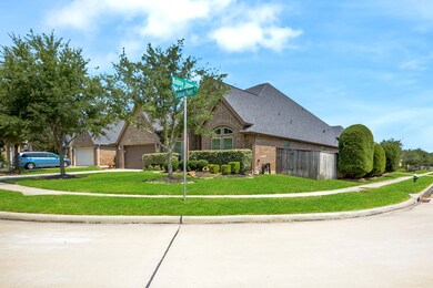 On a corner lot with plenty of driveway space up to your 3 car garage.