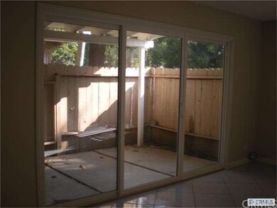 New dual pane sliding door leads from breakfast no