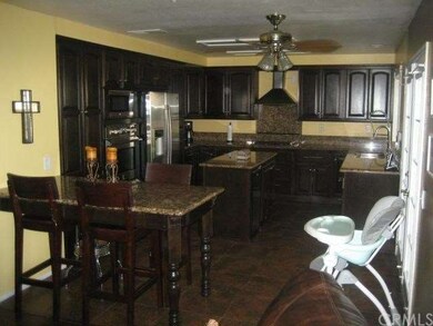 REMODELED OPEN KITCHEN WITH GRANITE COUNTER TOPS, 